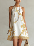 MINIVESTIDO DE ENCAJE ESTAMPADO EN ORO BLANCO