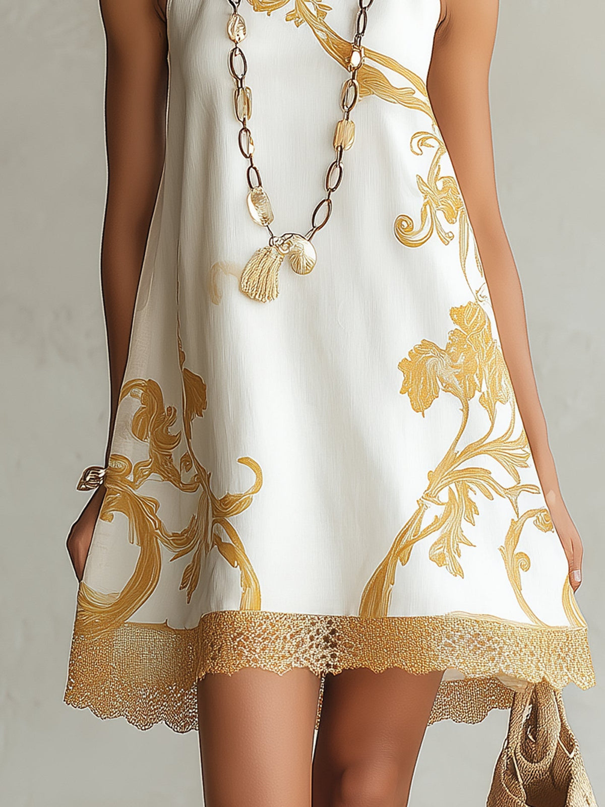 MINIVESTIDO DE ENCAJE ESTAMPADO EN ORO BLANCO