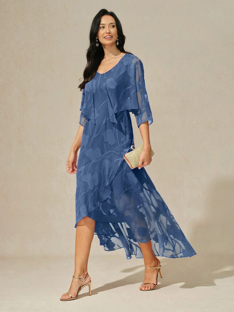 Vestido de noche de gasa floral azul marino con dobladillo asimétrico
