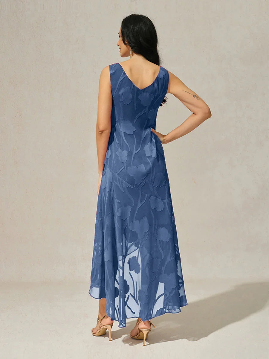 Vestido de noche de gasa floral azul marino con dobladillo asimétrico