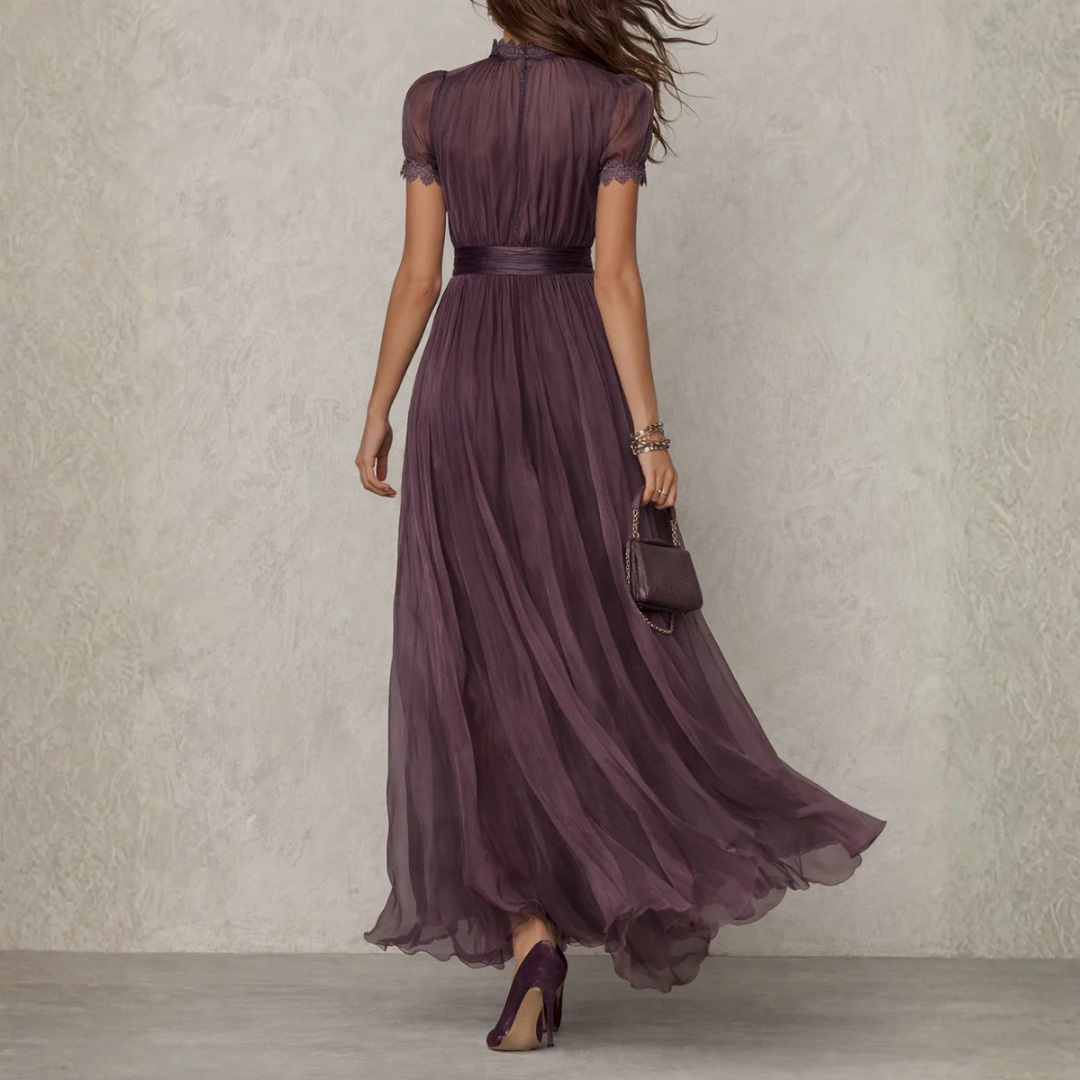 Vestido largo de gasa fluida para mujer con detalle de lazo en el cuello.