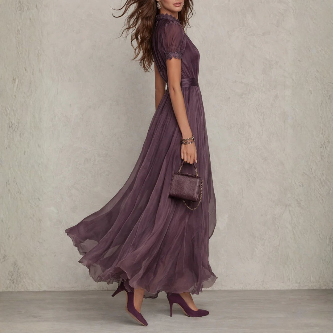 Vestido largo de gasa fluida para mujer con detalle de lazo en el cuello.
