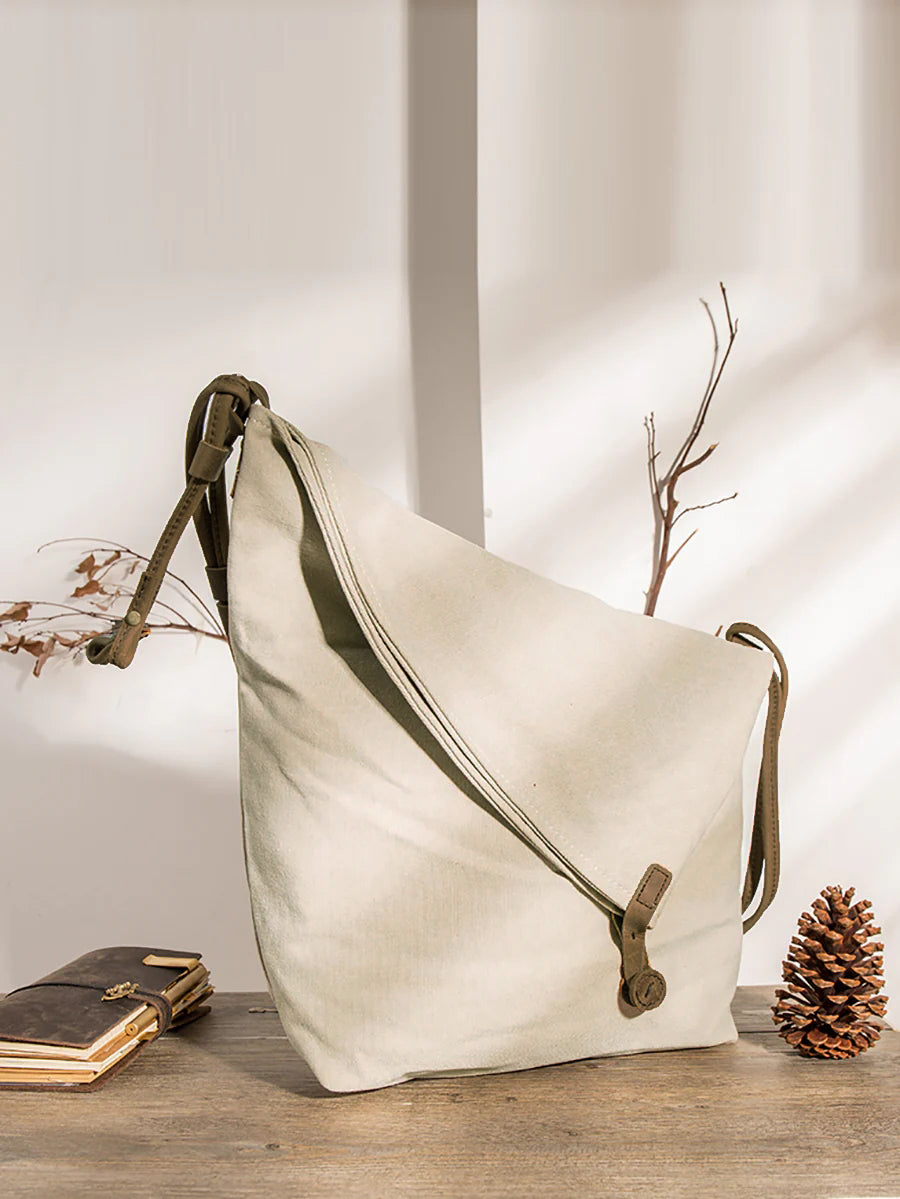 Borsa a tracolla in tela e pelle da donna