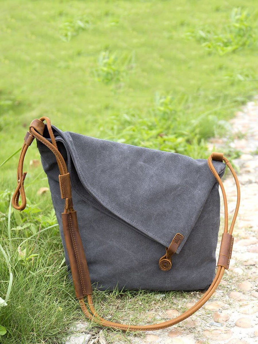 Borsa a tracolla in tela e pelle da donna