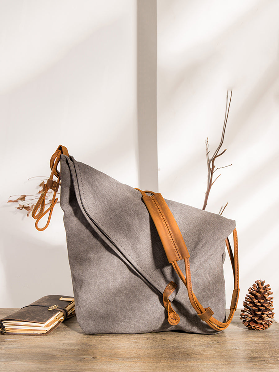 Borsa a tracolla in tela e pelle da donna