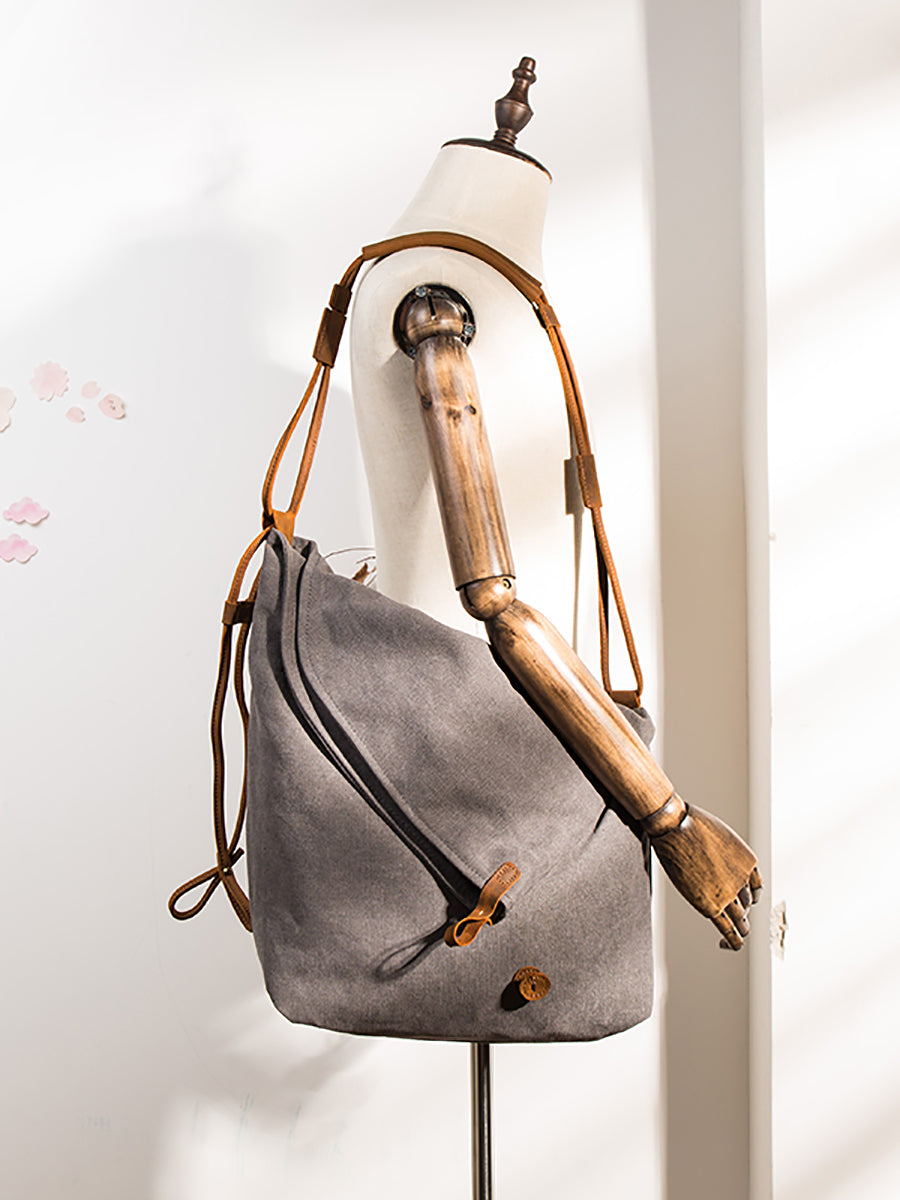 Borsa a tracolla in tela e pelle da donna