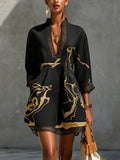 MINIVESTIDO DE ENCAJE DE GANCHILLO CON ESTAMPADO NEGRO Y DORADO Y ESCOTE EN V