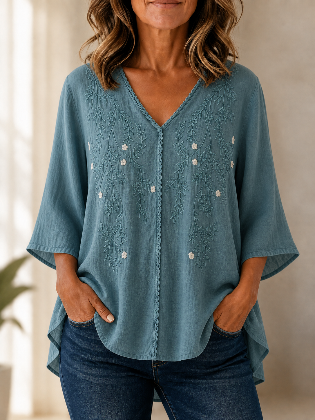 Blusa gris lavanda con detalle de botones