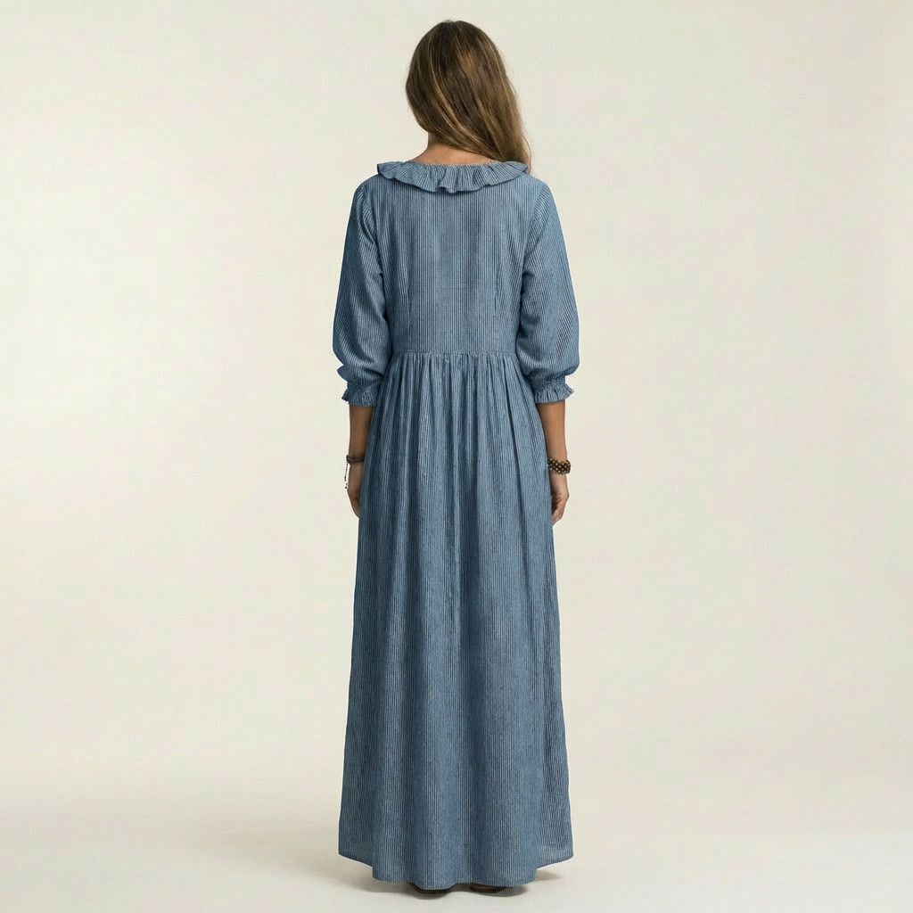 Vestido largo Willemien con escote de volantes y mangas farol.